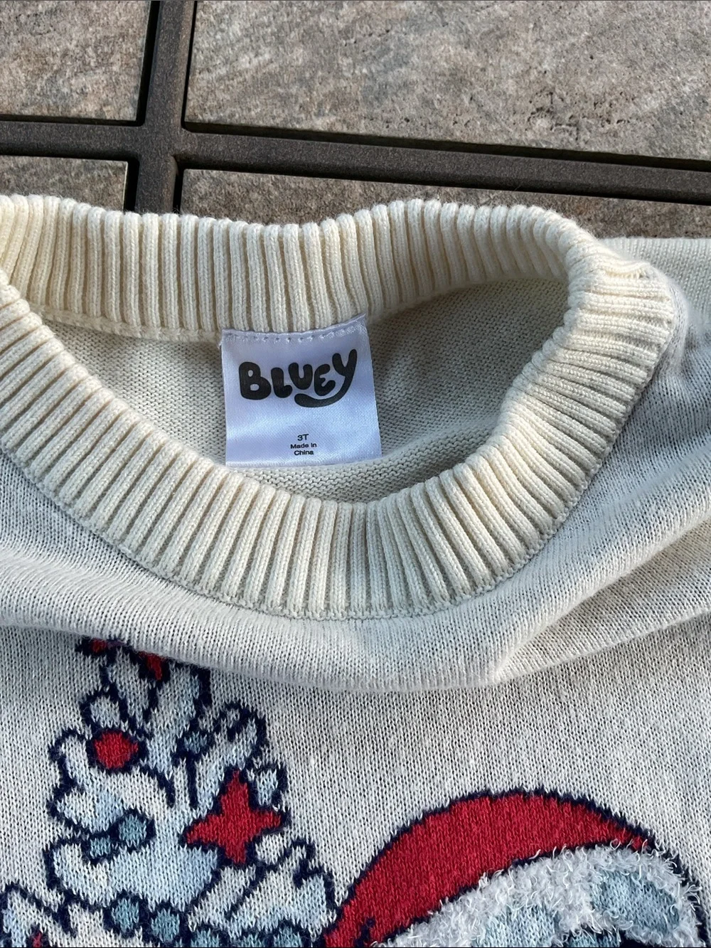 Bluey cream holiday sweater